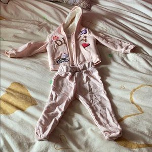 Children place sweat suit